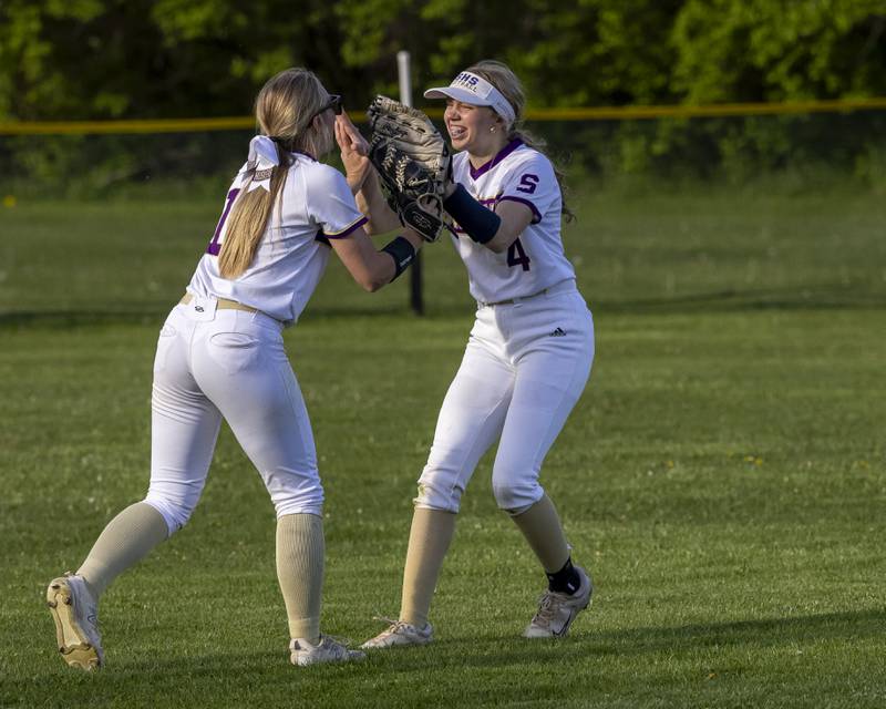 Brynlee Glade and Maddie Young of Serena High School celebrate Glade's diving catch during the game on April 29, 2025 at Newark High School.