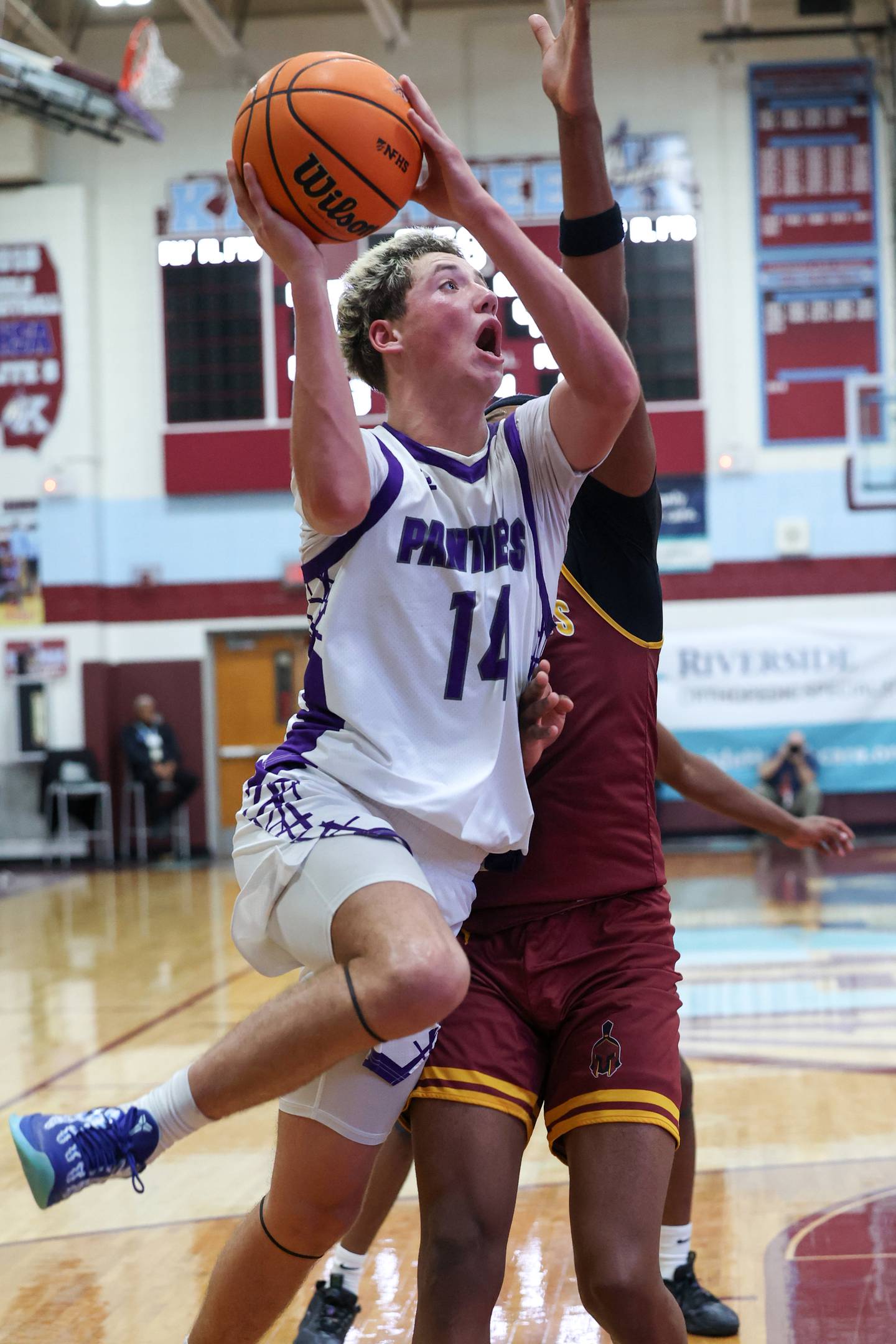 Manteno's Dylan Polito goes for a layup under pressure during the Panthers' 65-52 loss to Christ the King in the Kankakee Holiday Tournament blue bracket championship game on Sunday, Dec. 28, 2025.