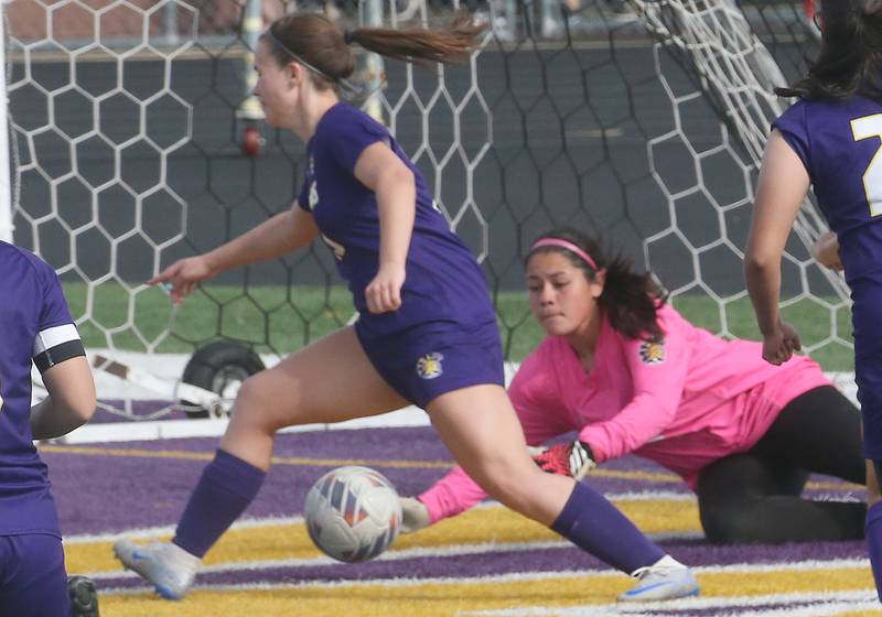 Mendota keeper Airam Cuevas stops a shot with the help from teammate Addy Allensworth against Dixon on Wednesday, May 1, 2024 at Mendota High School.