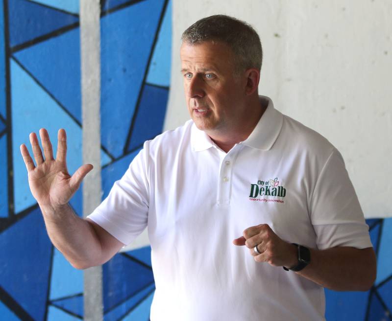 DeKalb Mayor Cohen Barnes speaks prior to the ribbon cutting Friday, June 18, 2021, for the Unity mural on the underpass below Lincoln Highway near Northern Illinois University. The mural was painted by four local artists, Aaron Robertson, Ivy Vargas, Jordan Jacob, and Shannon Gallagher.