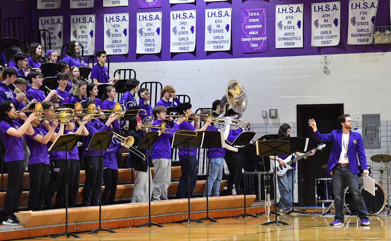 The Downers Grove North Pep Band performs during a timeout in the Trojans’ girls basketball game against Glenbard West on January 17, 2026 at Downers Grove North High School in Downers Grove .