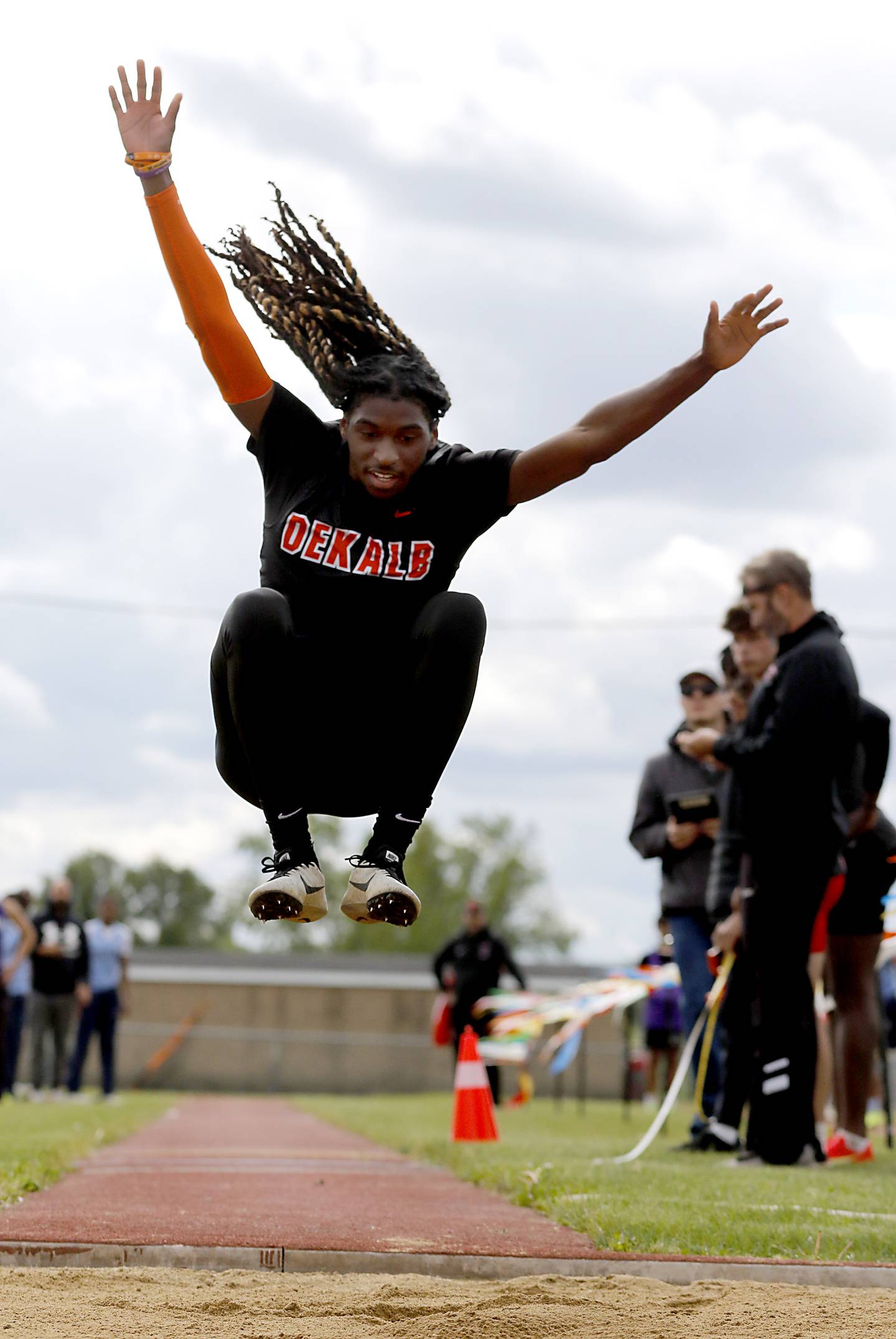 DeKalb’s Ricai Nellums competes in the triple jump during the Huntley IHSA Class 3A Boys Sectional Track and Field Meet on Thursday, May 22, 2025, at Huntley High School.
