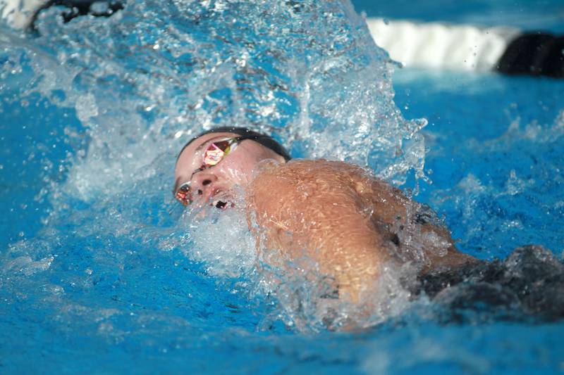 Crystal Lake South co-op's Abby Uhl swims the 200-yard freestyle championship heat during the IHSA Girls State Swimming and Diving Championships at the FMC Natatorium in Westmont on Saturday, Nov. 11, 2023.