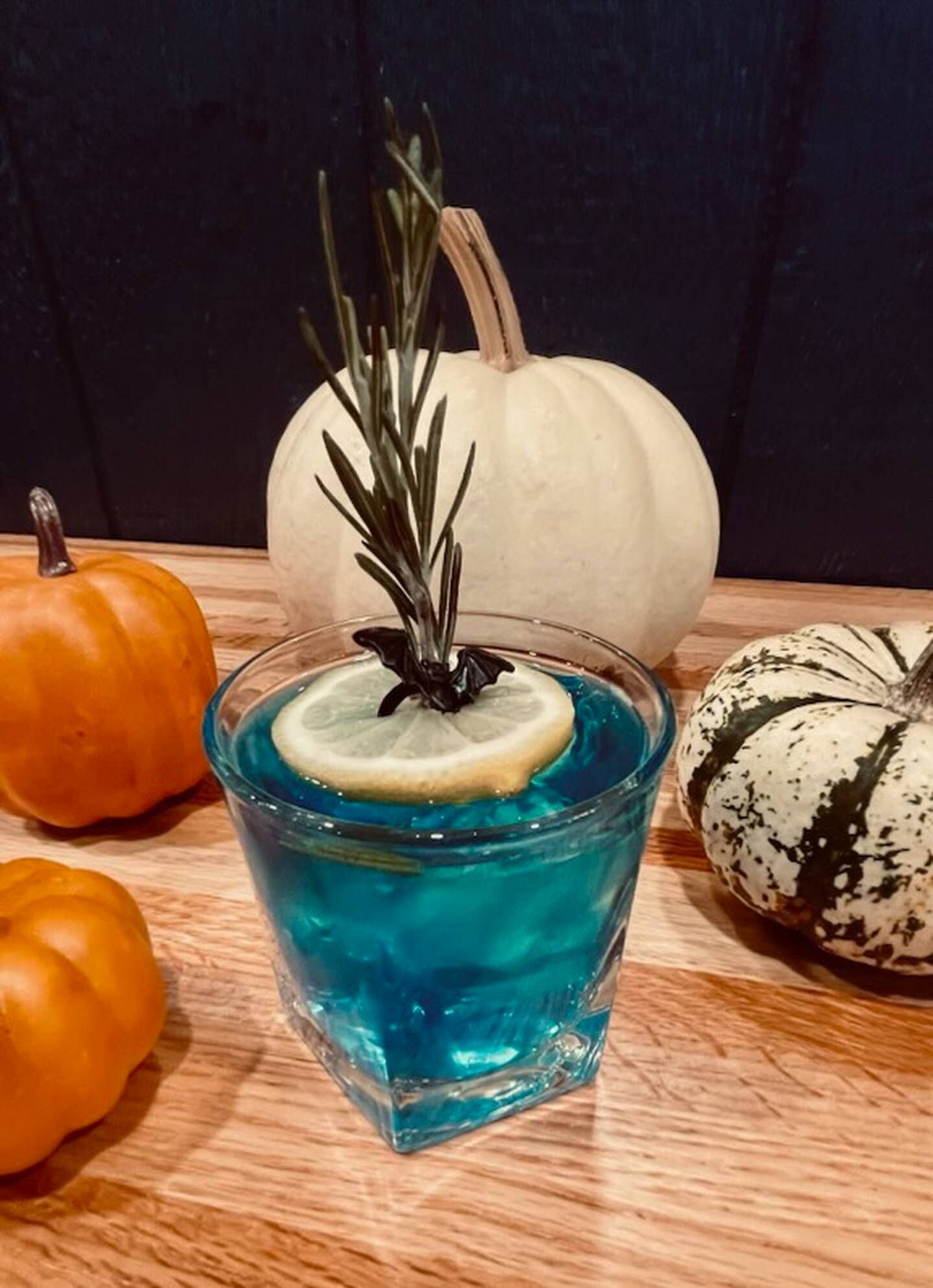 The Witches Brew, which has Empress 1908 Indigo Gin, sparkling lemonade, Blue Curacao and fresh rosemary sprig, from Osteria by Capri in Downers Grove.