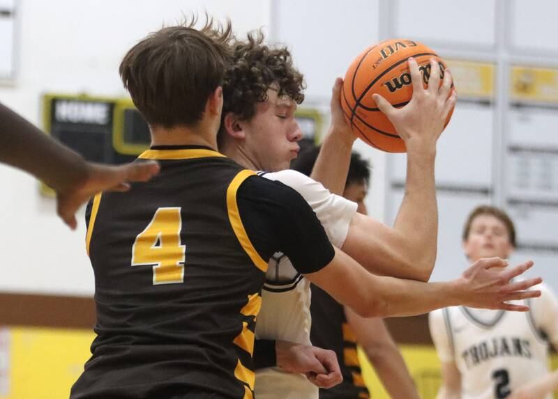 Cary-Grove’s Ryan Boutwell moves the ball during Hinkle Holiday Classic varsity boys basketball tournament action on Thursday, Dec. 26, 2024 at Jacobs High School in Algonquin.