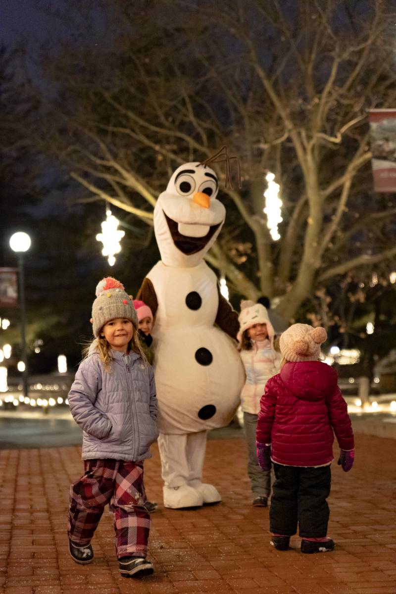 Across the park, thousands of twinkling lights adorn street lamps, trees and buildings; lighted candy canes illuminate walking paths; and classic holiday music drifts in the background throughout the event.