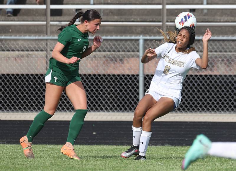 Sycamore's Tyanna Clark heads the ball in front of Boylan's Ava Galluzzo during their Class 2A sectional semifinal game Tuesday, May 21, 2024, at Belvidere High School.