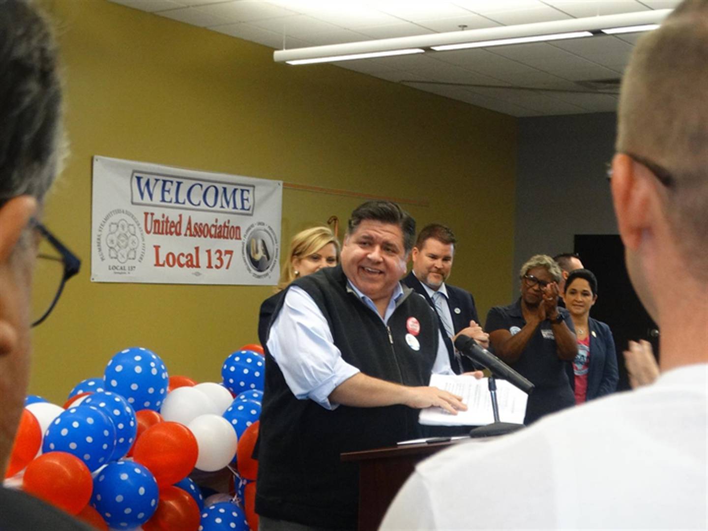 Gov. JB Pritzker speaks at a get-out-the-vote rally in Springfield Monday