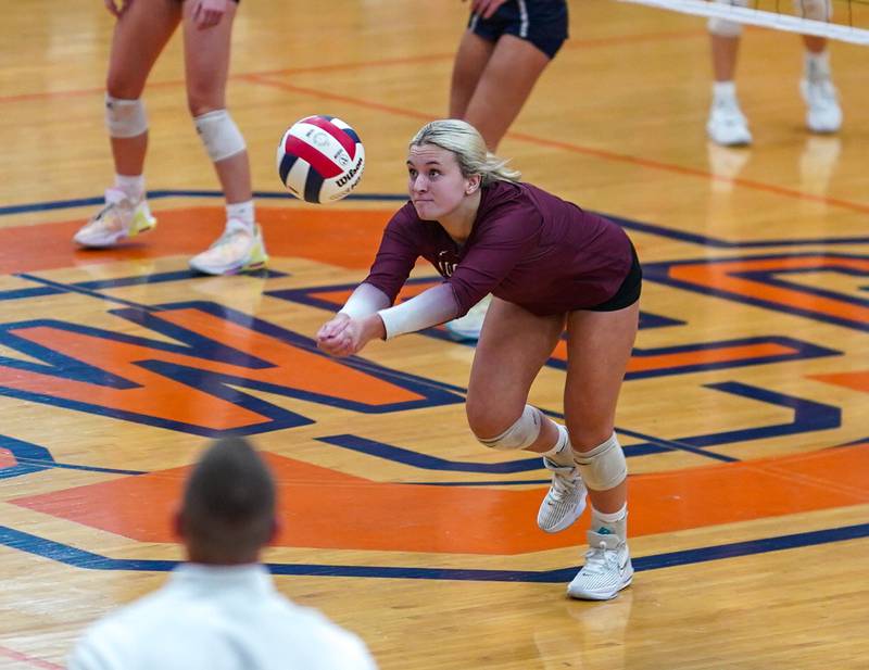Lockport's Lainey Green (7) sets the ball against Oswego during a class 4A Oswego Sectional semifinal match at Oswego High School on Monday, Oct. 30, 2023.