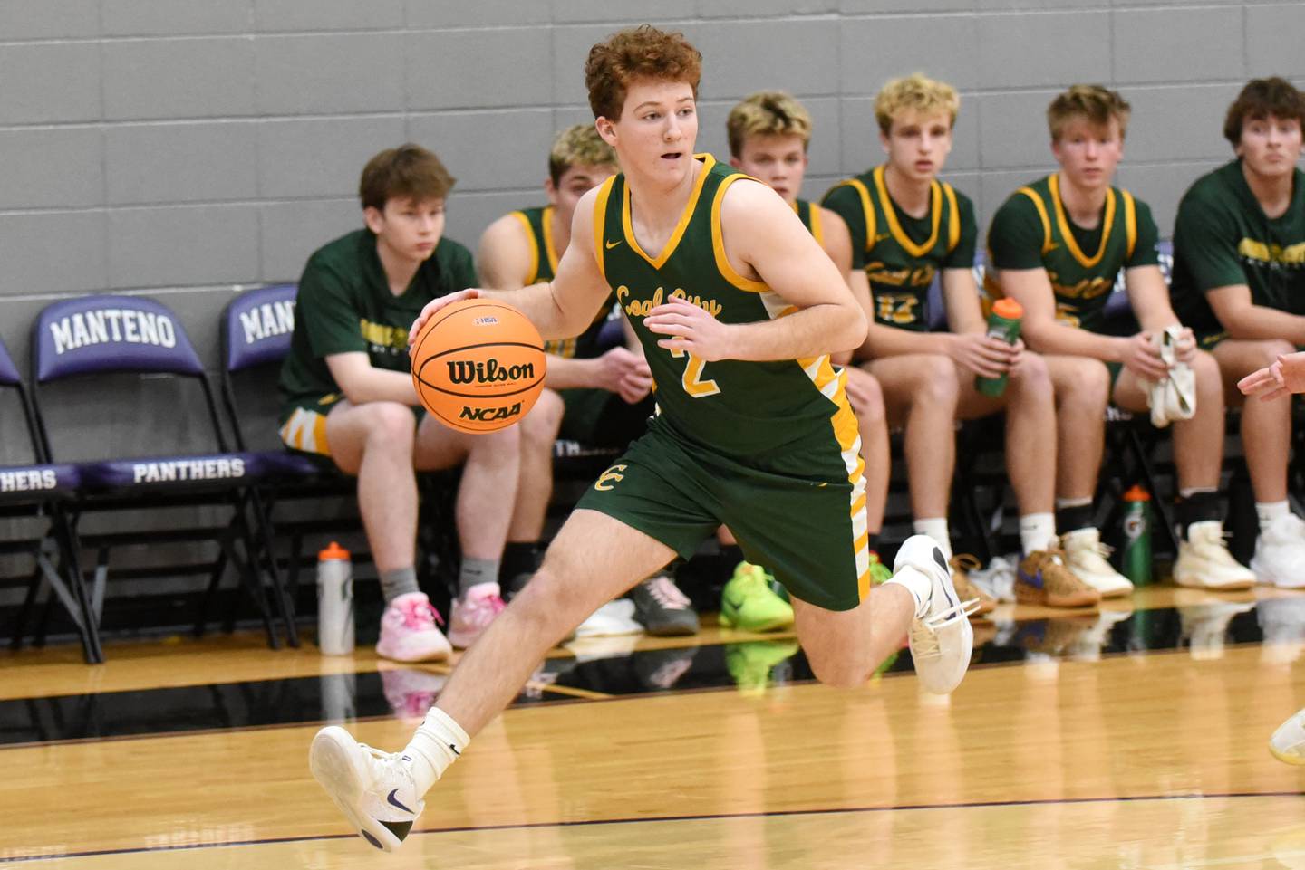 Coal City's Braden Walker dribbles during the IHSA Class 2A Manteno Regional quarterfinals at Manteno Monday, Feb. 23, 2026.