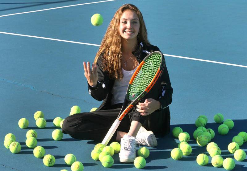 Kaneland senior Piper Schrepferman, on the tennis courts at the school Friday, is the Daily Chronicle Girls Tennis Player of the Year.