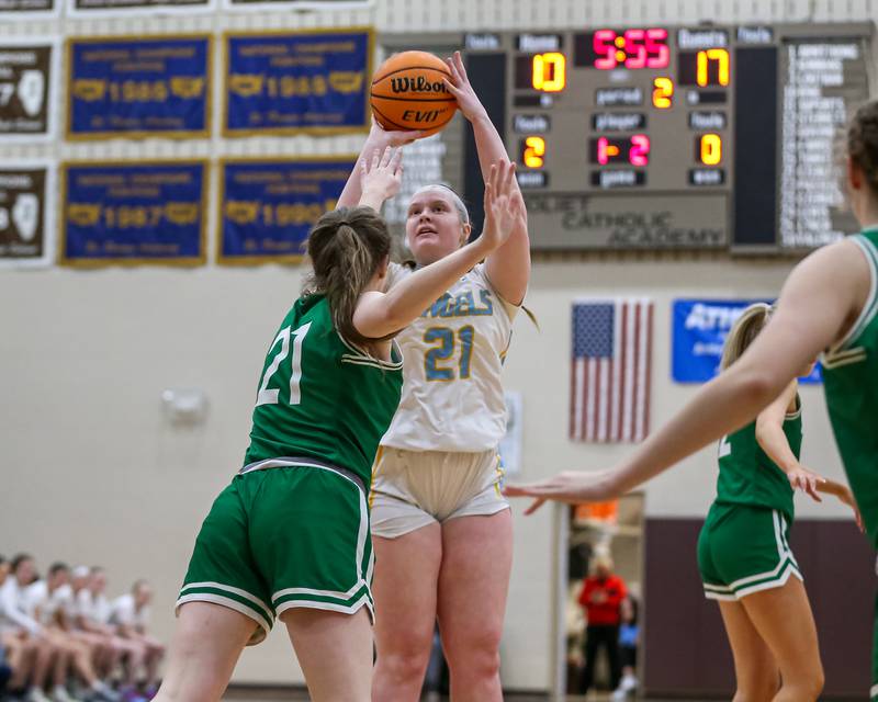 Joliet Catholic's Emma Birsa (21) shoots a short jumper during their basketball game between Providence Catholic at Joliet Catholic. Feb 11, 2025 in Joliet.