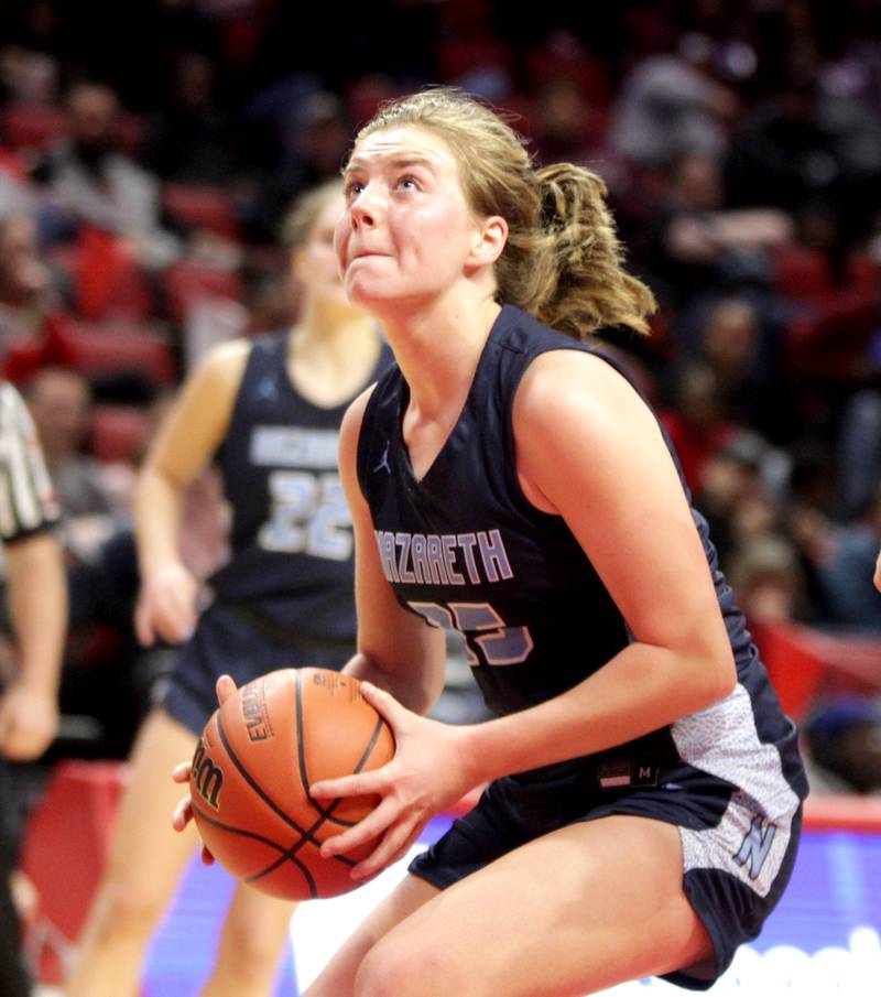 Nazareth Academy's Amalia Dray looks for an opening during the Class 3A girls basketball state semifinal against Peoria at Redbird Arena in Normal on Friday, March 3, 2023.
