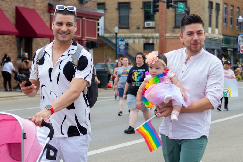 Paraders walk in the Ottawa Family Pride Fest Parade on Saturday, June 8, 2024 at Jordan Block Park in Ottawa.