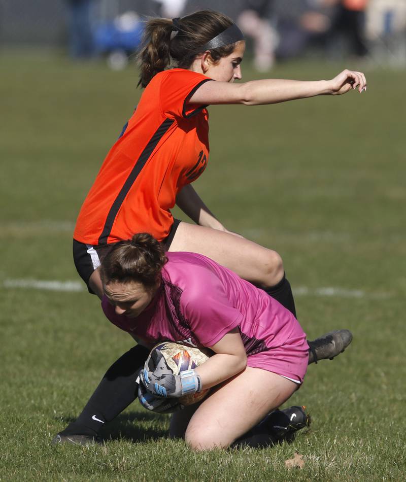 Huntley's Maddie Lackovic grabs the ball away from Crystal Lake Central's Jordin Gaunaurd during a Fox Valley Conference soccer game on Tuesday, April 9, 2024, at Crystal Lake Central High School.