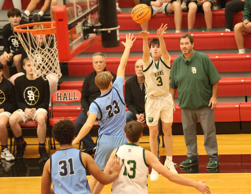 St. Bede's Alec Tomsha shoots a jump shot over Bureau Valley's Brandobn Carrington during the Colmone Classic on Thursday, Dec. 11, 2025 at Hall High School.