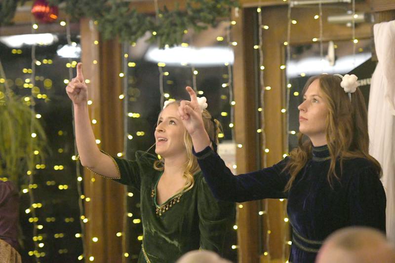 Oregon High School Madrigals Jennica Ciesiel and Olivia Wynn portrayed sheep during the 2022 performance at the Brubaker Center at Stronghold Camp & Retreat Center. This year's dinners are Dec. 8-9.