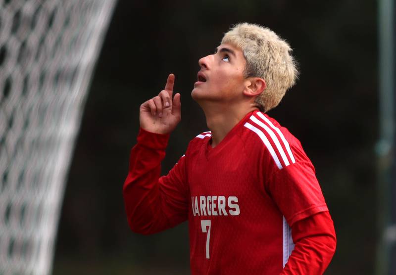 Dundee-Crown’s Hugo Arista points skyward after scoring his first of three goals against St. Charles East in IHSA Class 3A Regional Championship soccer at Dundee-Crown High School in Carpentersville on Saturday, October 25, 2025.