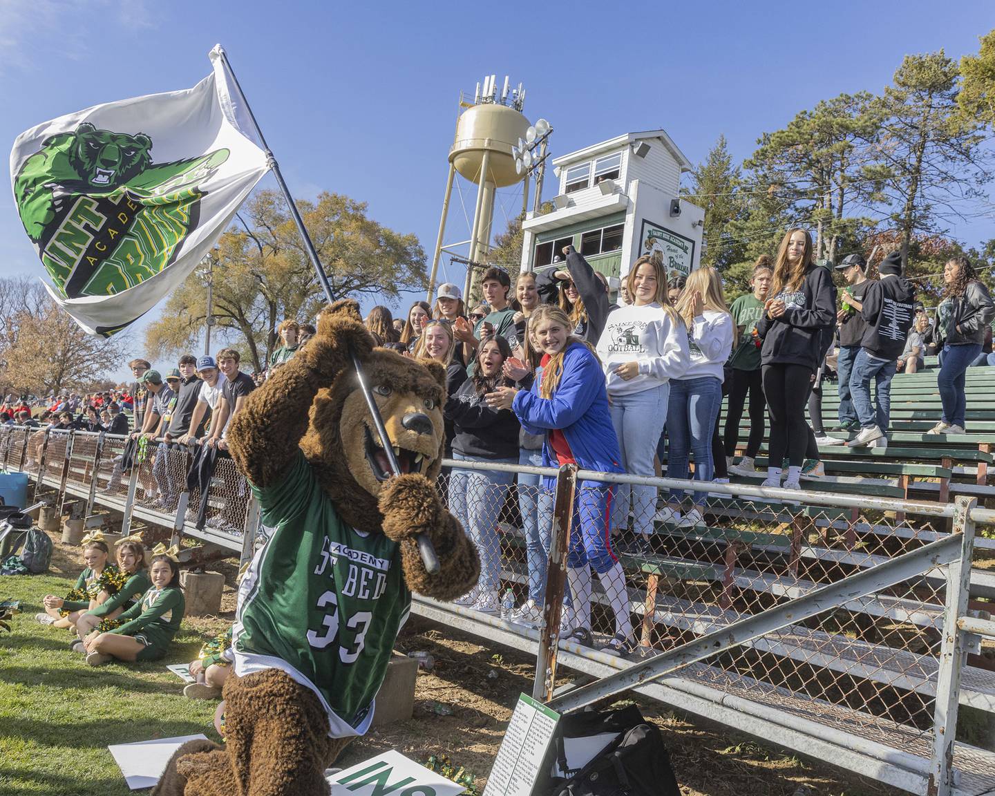 The St. Bede Bruin mascot runs with the school flag past the student section after the team scored a touchdown over Forreston during the Class 1A first round playoff game on Saturday, Oct. 29, 2022 at the Academy in Peru.