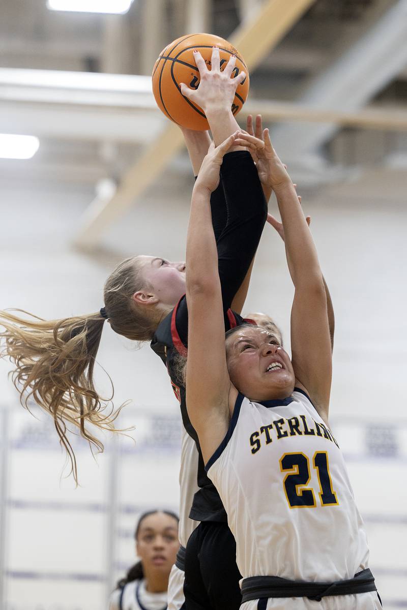 Stillman Valley’s Lillian Green hauls down a rebound over Sterling’s Jae James Friday, Dec. 27, 2024, during the Dixon Girls KSB Holiday Basketball Classic.