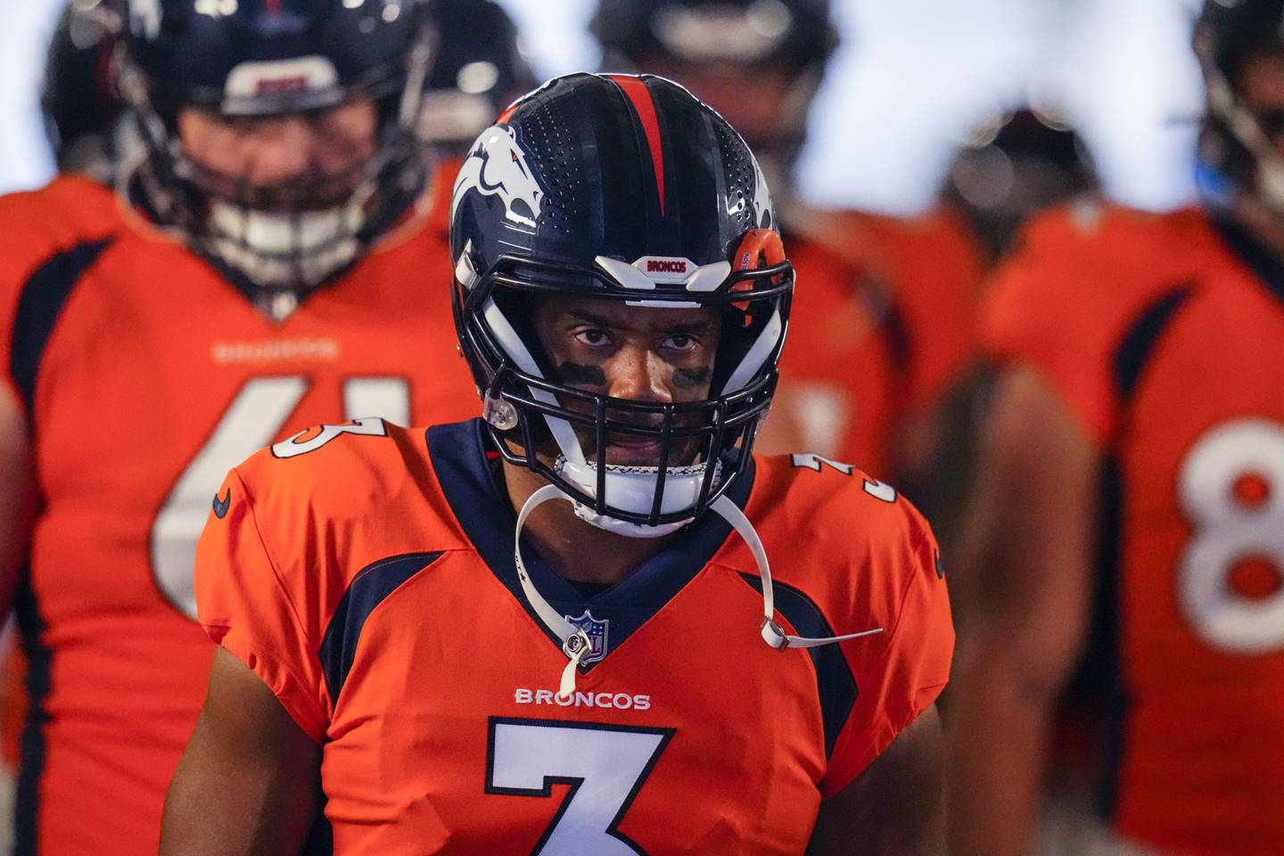 Denver Broncos quarterback Russell Wilson takes the field against the Minnesota Vikings during an NFL preseason football game, Saturday, Aug. 27, 2022, in Denver. (AP Photo/Jack Dempsey)