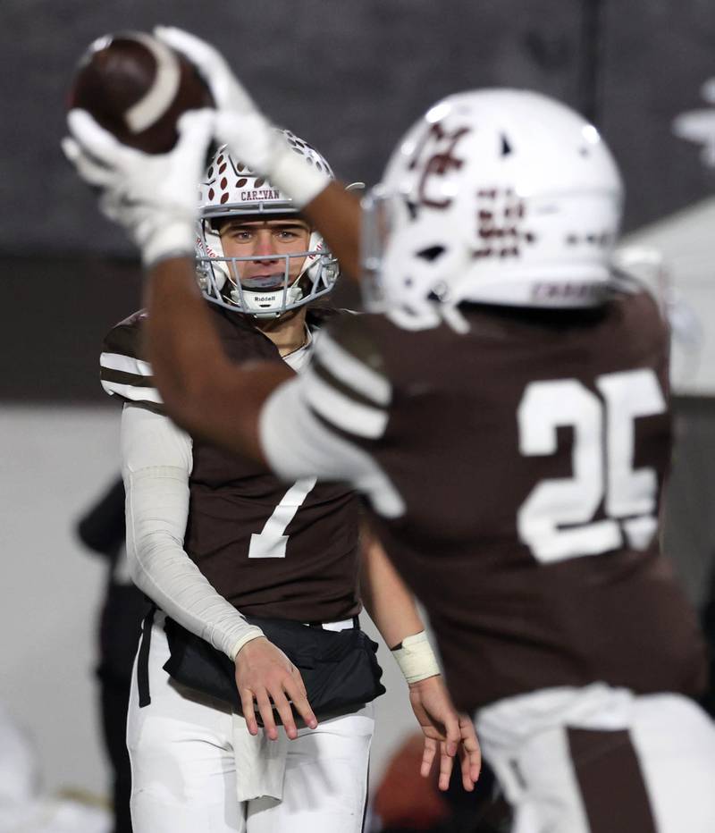 Mount Carmel's Carmel's Madden Wilson catches the pass from quarterback Emmett Dowling Wednesday, Dec. 3, 2025, during their IHSA Class 8A state chamionship game in Huskie Stadium at Northern Illinois University in DeKalb.