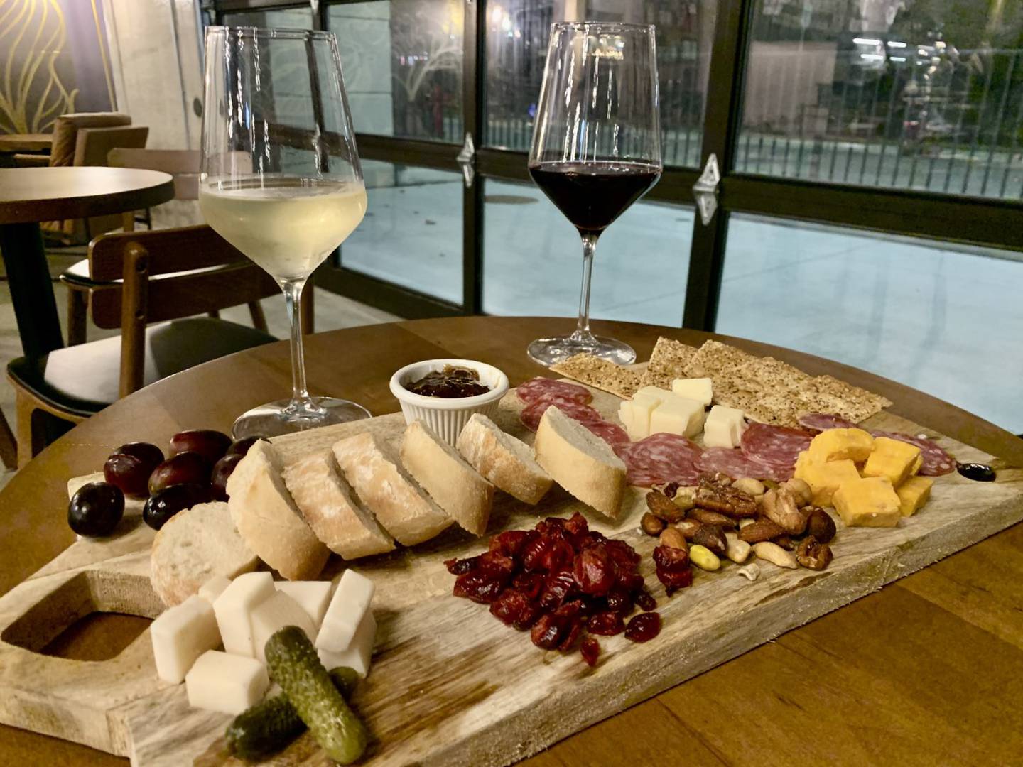 In the evenings, Oak + Bean replaces breakfast sandwiches and coffee with charcuterie and wine.