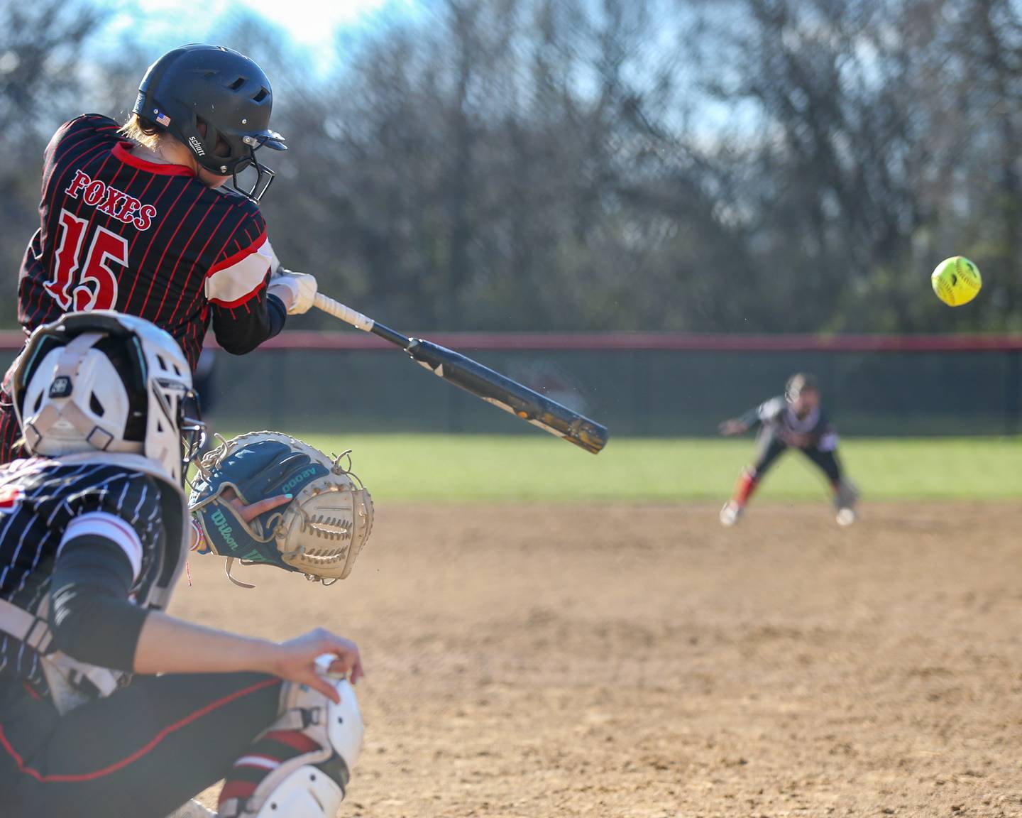 Yorkvillle's Regan Bishop connects on a pitch during softball game between Benet at Yorkville.  April 5th, 2024.