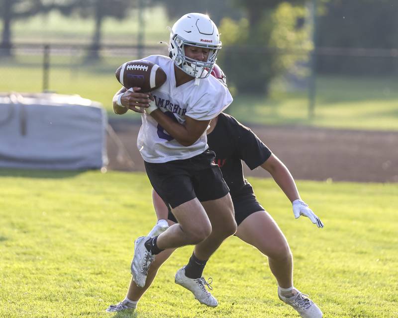 Hampshire's Chris Whetstone attempts a reception during the Kaneland 7 on 7 football tournament, July 22, 2025 in Maple Park.