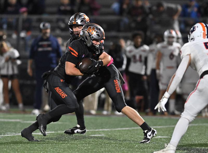 Minooka's Chase Nurczyk (2)  running the ball during the conference game against Oswego on Friday, OCT. 10, 2025, at Minooka.