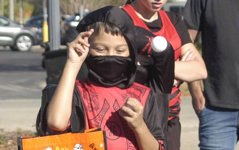 Levi Smith tosses a ball in a game at Sterling's Halloween Town. The Craft Beer Festival and Halloween Town offered fun for all in downtown Sterling The events took place on Saturday, October 11th, 2025.