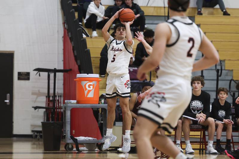 Lincoln-Way Central’s Ben McLaughlin puts up the corner three against Lockport on Tuesday, Jan. 23rd, 2024 in New Lenox.