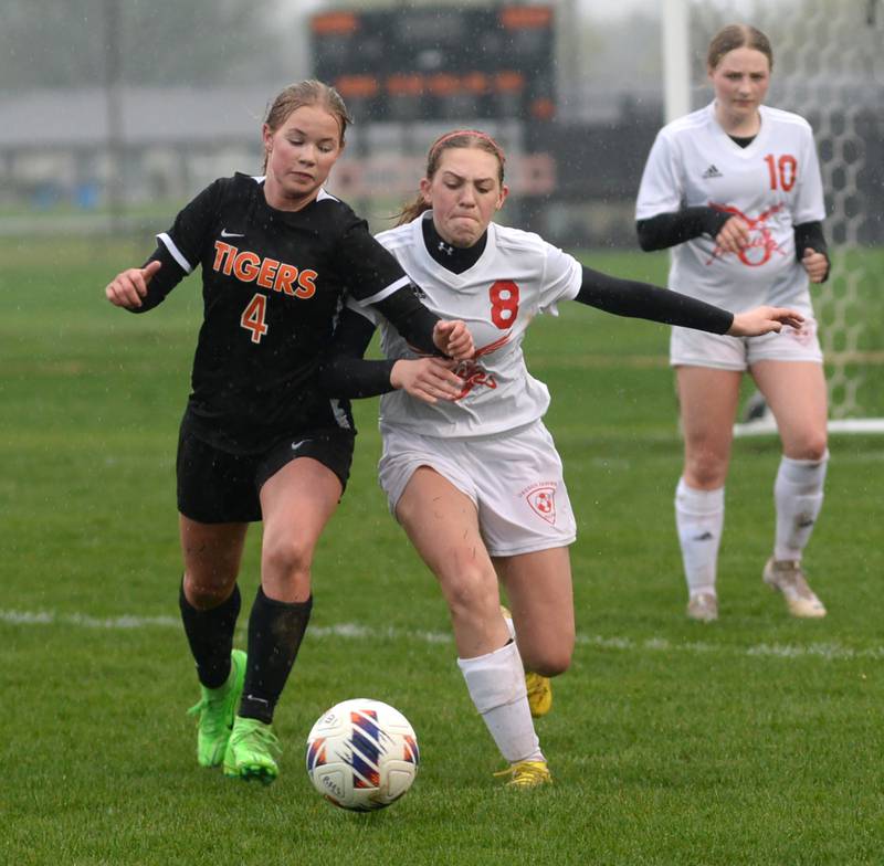 Oregon's Addison Rufer (8) and Byron's Alya Roschi fight for the ball on Thursday, April 18, 2024 at Byron High School.