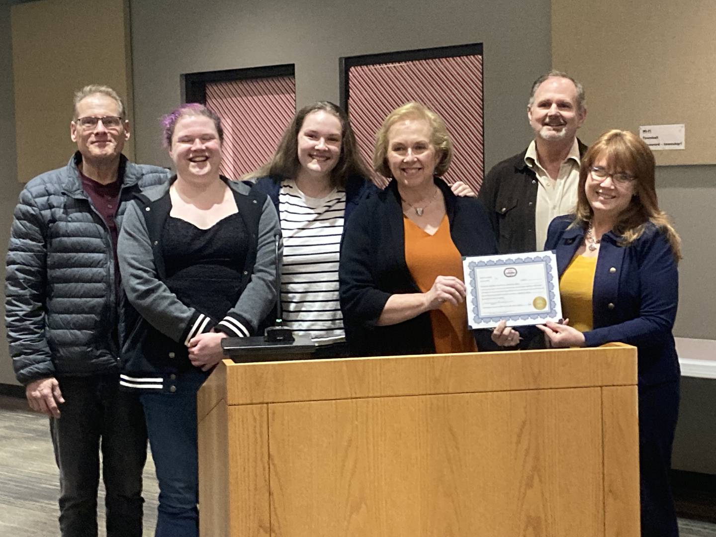 Robin Lif stands with City Clerk Kathy Gentile, Mayor Steven Streit, husband Ron Lif, and daughters Emily and Natalie Lif. 
Wednesday, January 7, 2026