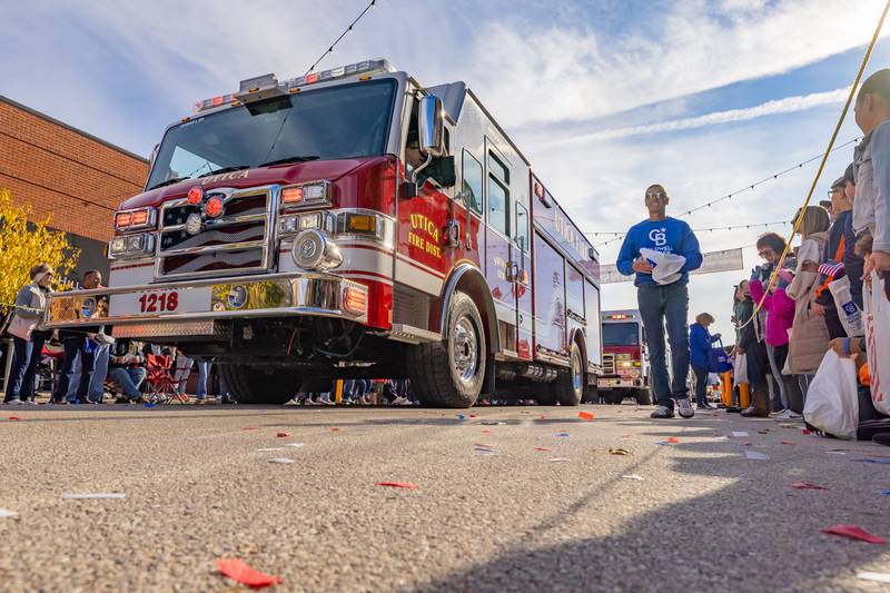 A Utica Fire Department truck passes through the parade at the Utica Veterans Parade and Airshow on November 2, 2025 in Utica.