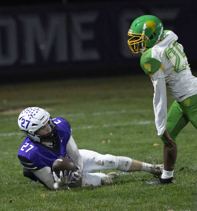 Dixon’s Eli Davidson hauls in a pass at the one-yard line against Chicago Ag Science Friday, Nov. 8, 2024 in the second round of the Class 4A football playoffs.