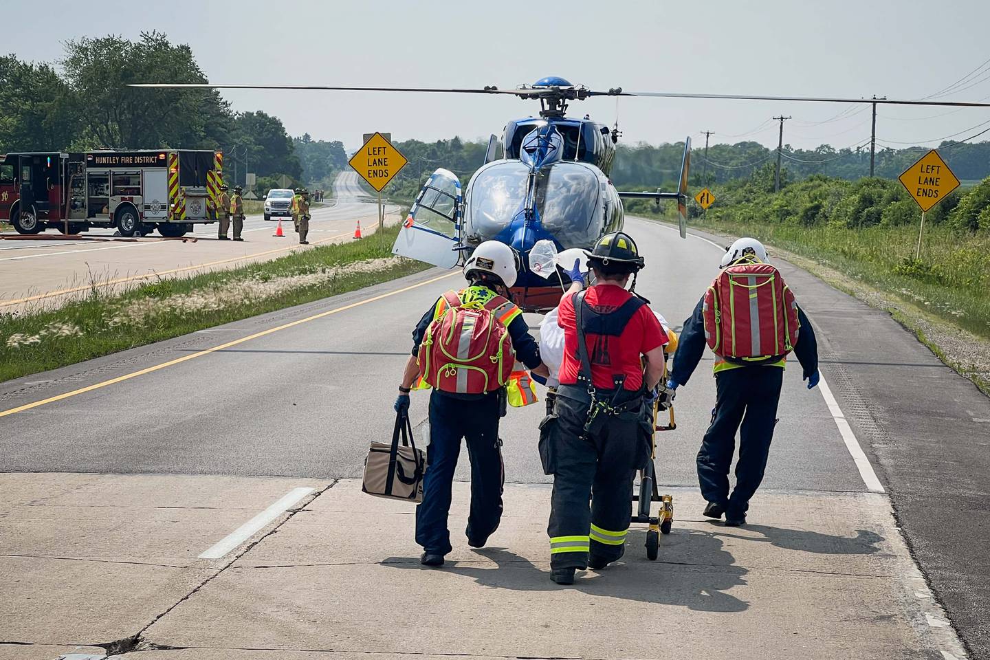 Four people were taken to area hospitals, including adults in serious to critical condition, following a two-vehicle crash on Friday, June 23, 2023, west of Woodstock.