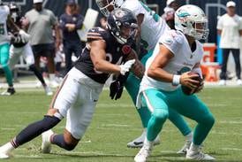 Chicago Bears place Austin Booker on IR, bring back Devin Duvernay, Scott Daly