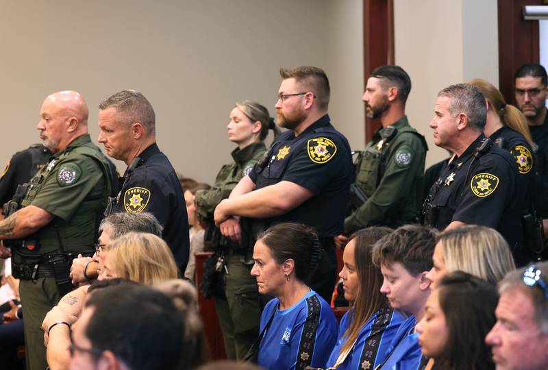Dozens of law enforcment members along with family and friends of Christina Musil pack the courtroom Tuesday, Aug. 26, 2025, during the sentencing hearing for Nathan P. Sweeney, who pleaded guilty to driving under the influence and causing the 2024 crash that killed Musil. Sweeney was sentenced to the maximum of 14 years.
