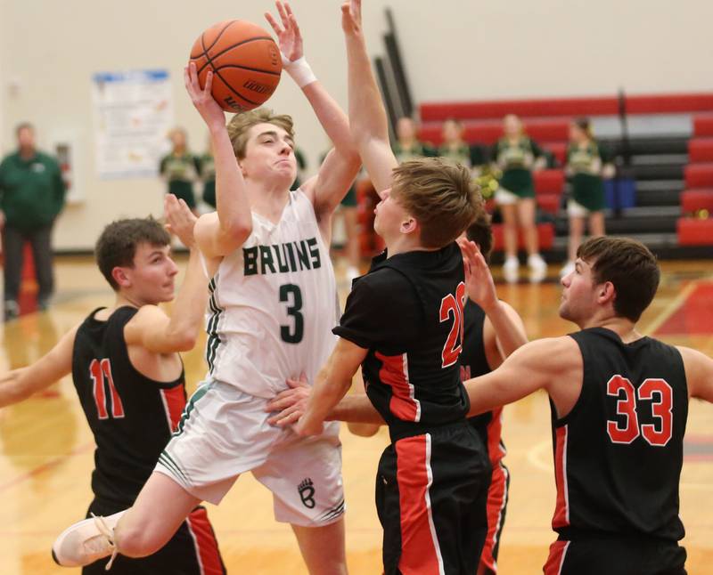 St. Bede's Alex Ankiewcz shoots a jump shot over Stillman Valley's Ian Seper during the 49th annual Colmone Class on Thursday, Dec. 7, 2023 at Hall High School.