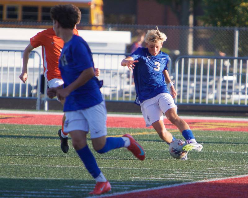 St. Charles North's Henry Dodd controls the ball against St. Charles East on Thursday, Sept. 25, 2025 in Batavia.