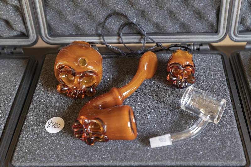Glass work from Andrew Kauchak is seen on display Friday, July 12, 2024 at Herbal Roots’ Cannafest at Elks Page Park.