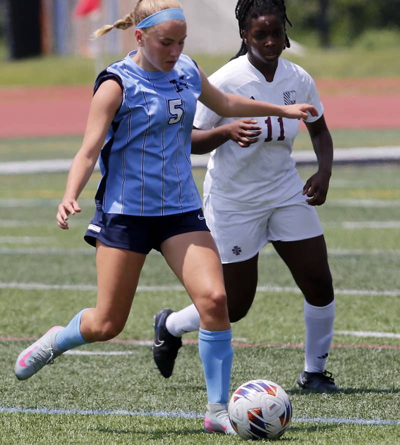 Nazareth Academy's Esme Bleskin controls the ball in front of St. Ignatius College Prep's Kayla Washington during a IHSA Class 2A State Girls Soccer semifinal match on Friday, June 6, 2025, at North Central College in Naperville.