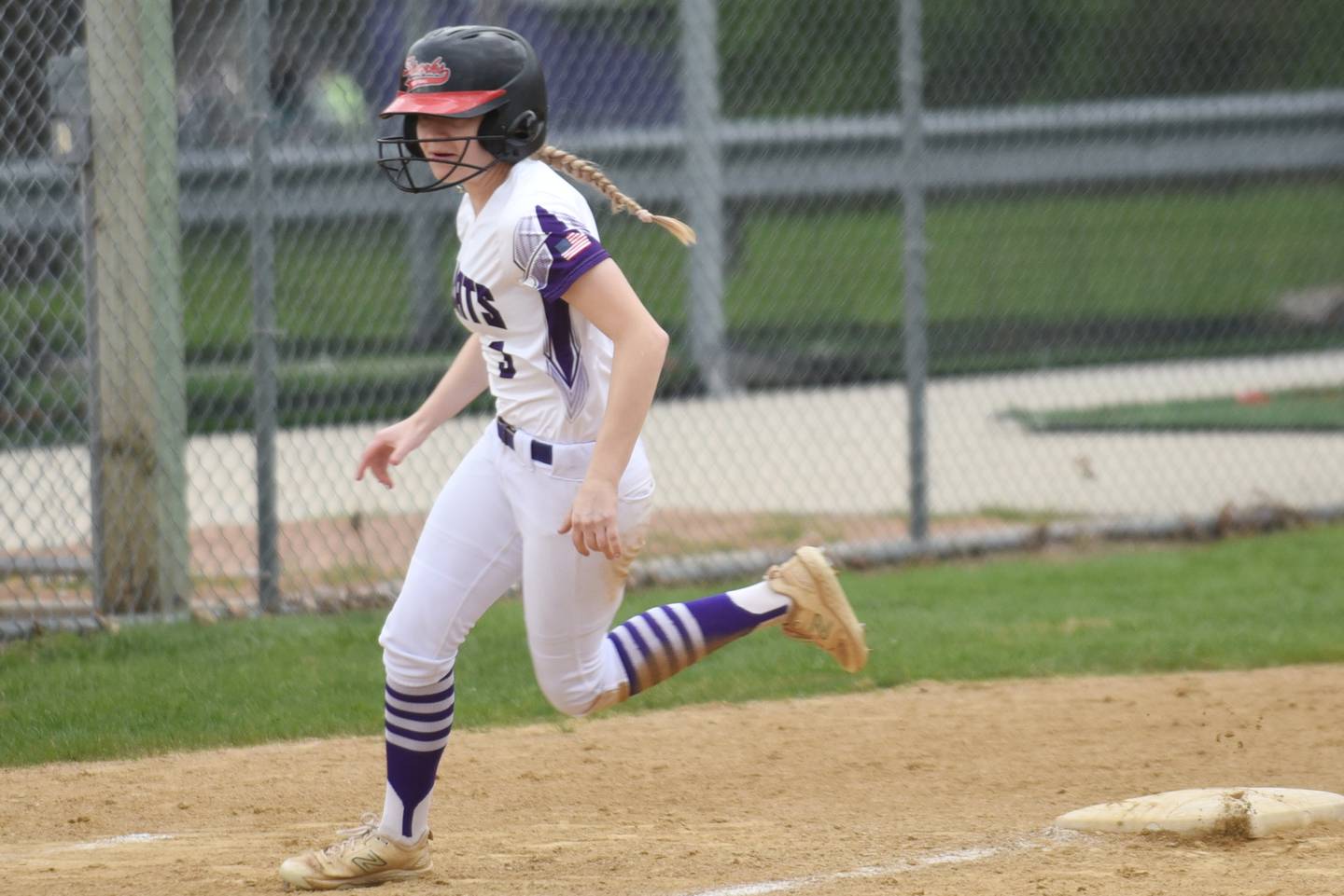 Wilmington's Nina Egizio rounds third on her way home for the first run of a home game against Manteno Tuesday, April 21, 2026.