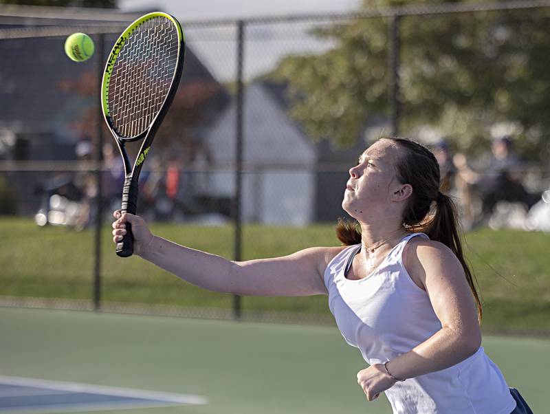 Sterling’s Sadie Hendrix plays a shot against Dixon in a doubles match Thursday, Sept. 28, 2023 in Sterling.