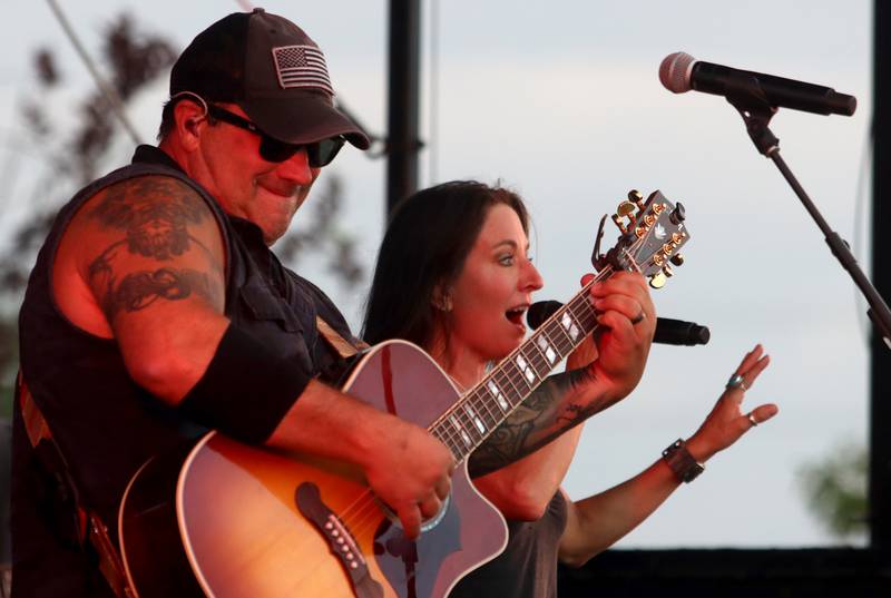 The Nashville Electric Company band entertains Saturday, July 2, 2022, during the Red, White and Blue Food Truck FEASTival at Milky Way Park in Harvard.