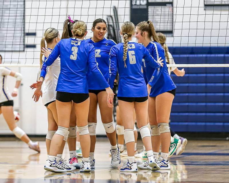 St Charles North celebrates a point during Class 4A Lake Park Regional final volleyball match between Wheaton North at St Charles North.  Oct 31, 2024  in Roselle.