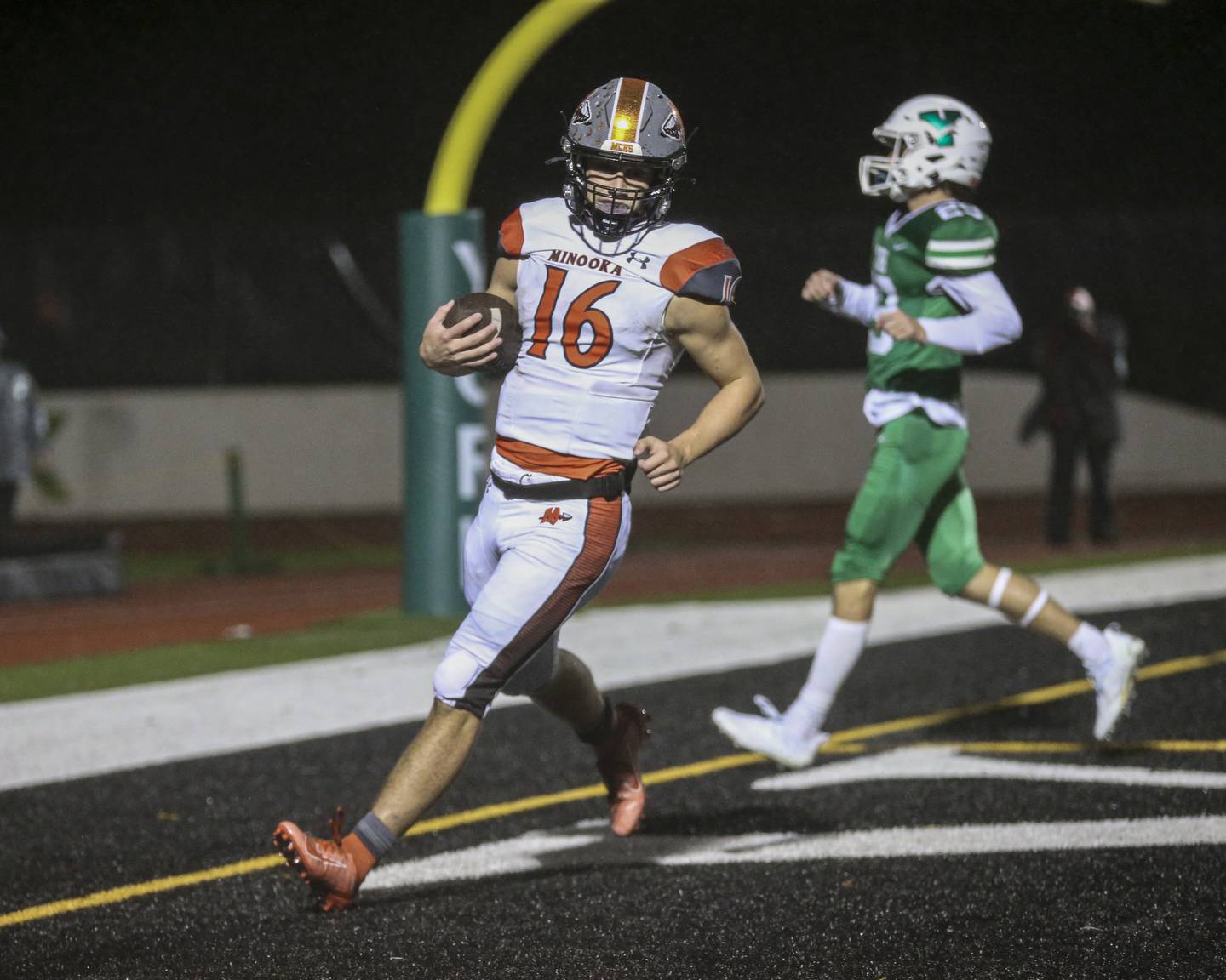 Minooka's Ethan Murphy (16) scores a touchdown after a short catch during Class 8A playoffs first-round game between Minooka at York.  Oct 29, 2021.