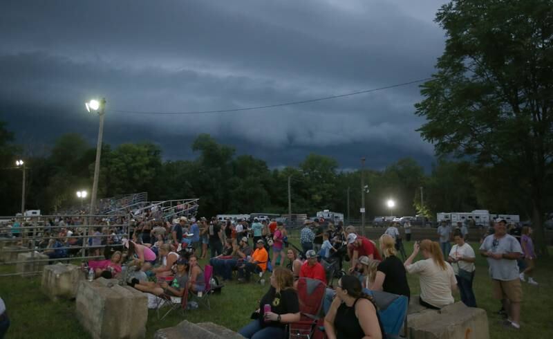 Storm clouds roll in during the Broken Horn Rodeo at the La Salle County 4-H Show and Junior Fair on Friday, July 14, 2023 in Ottawa.