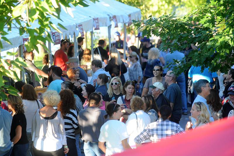 Crowds pack the brew tents during Brew at the Bridge at Hudson Crossing Park in downtown Oswego Saturday.